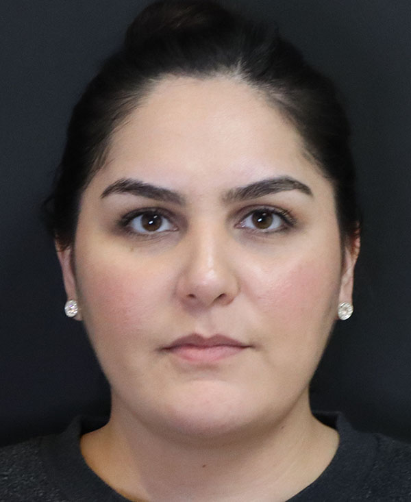 Professional headshot of Dr. Daniela Atencio, MD, with neutral expression.